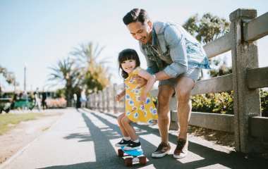 Man playing with his daughter