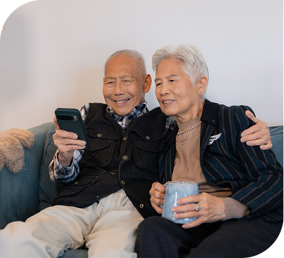 A couple looking at a phone together