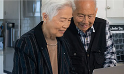 Couple looking at computer